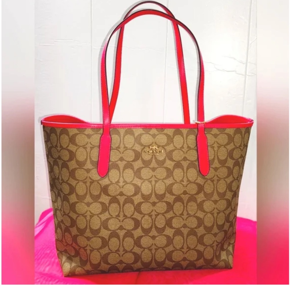 Coach large tote with matching wallet.